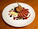 Confit duck leg, seared duck breast, pommes purée, wilted silver beet, black garlic purée, duc...jpg