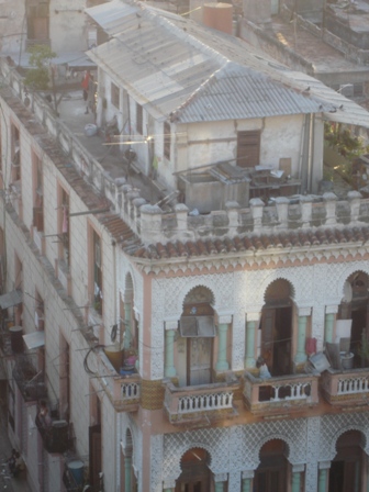 A roof top from the hotel with pigs 'n chickens.