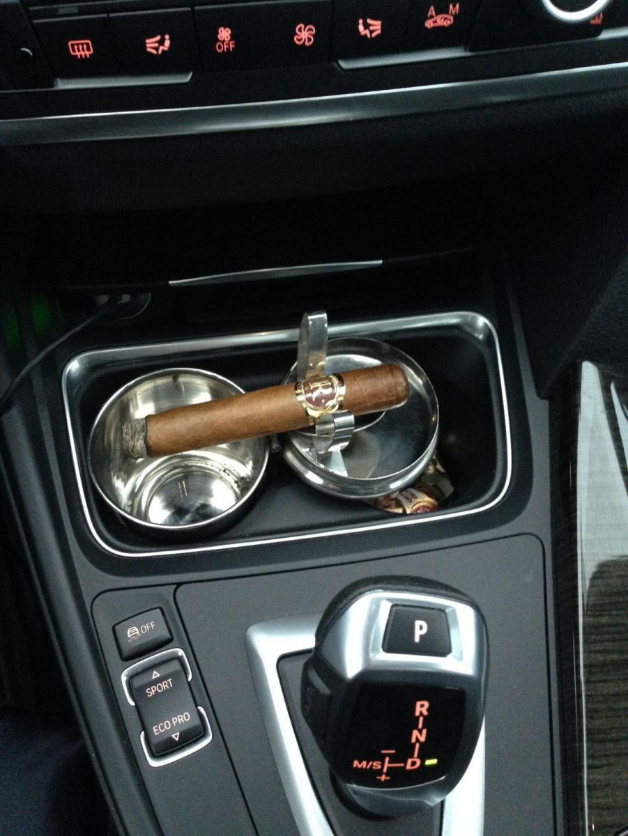 Favorite cigar car ashtray. I keep the whip smellin like heaven 24/7. Vegas.. as in Robaina